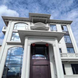 上饶白麻别墅外墙干挂石材效果示例