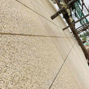 上饶 黄金麻花岗岩荔枝面外墙干挂石材效果示例