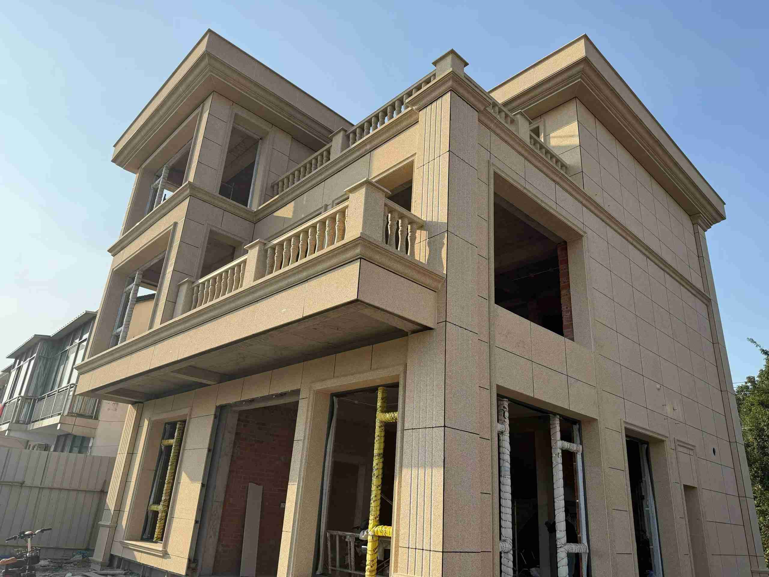 上饶 黄金麻花岗岩石材荔枝面外墙干挂效果展示